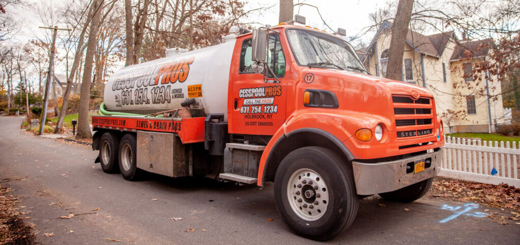 Cesspool Pros truck outside of house